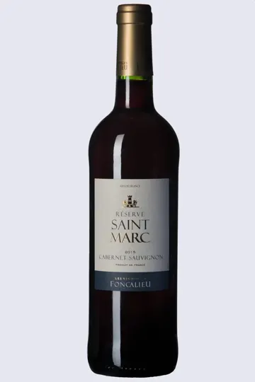 A dark wine bottle with a gold foil cap, set against a plain white background.